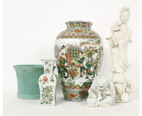 A group of Chinese porcelain, comprising a famille verte octagonal vase with warriors, 39cm, a blanc-de-chine guanyin, 45.5cm