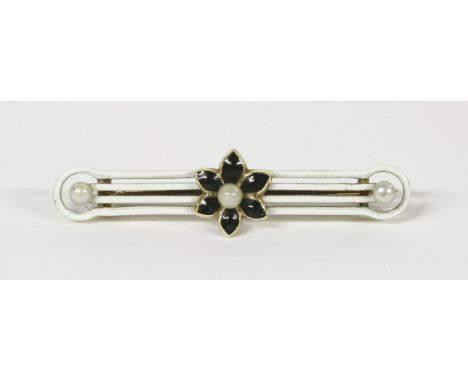 A Victorian gold enamel bar brooch, a cultured pearl set to a black enamel flower with white enamel and cultured pearl finial