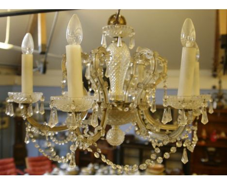 A glass six branch electrolier, with lustre bead chains, 59cm diameter approximately together with one further light fitting