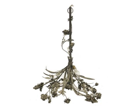 A large black-painted wrought iron ceiling light,20th century, in the form of a bunch of roses, 107cm high