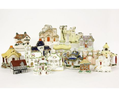 Sixteen various ceramic cottages, some older, some as pastille burners, including a Goss cottage, tallest 16cm