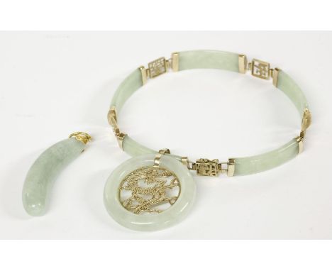 A 9ct gold jade panel bracelet with Chinese character links, a 9ct gold jade bi pendant set with a dragon to centre, and a ja