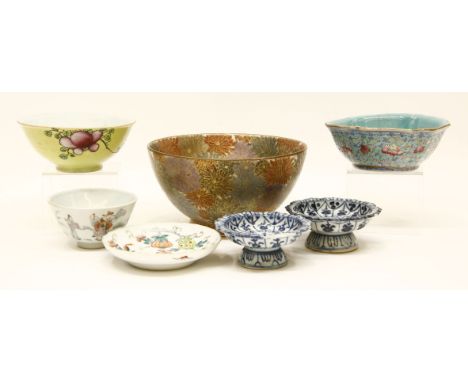 A collection of Chinese ceramics, comprising: a famille rose bowl, with flowers, against a yellow ground, two blue and white 