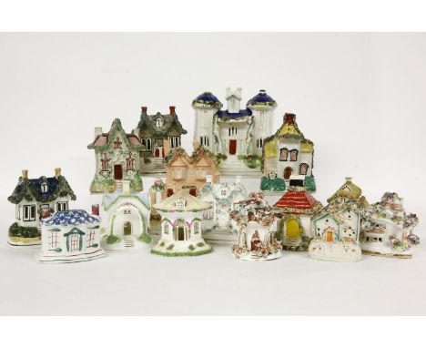 Fifteen various ceramic cottages, some older, some as pastille burners, including a Goss cottage, tallest 18cm