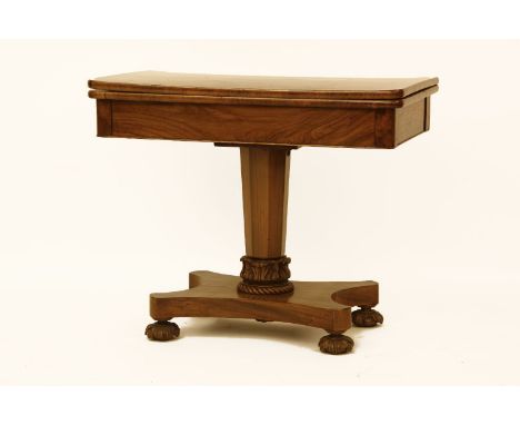 A 19th century walnut fold over card table, the rectangular top on facetted column, and quatreform base, descending onto carv