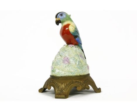 A Royal Doulton pottery cockatoo radio speaker, with a gilt metal base, 36cm highThese were made for Artandia in the 1920's