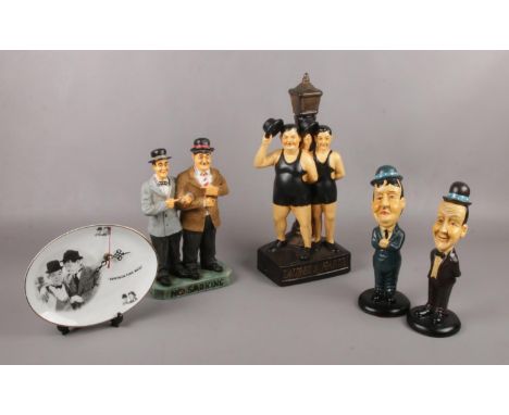 A group of Laurel &amp; Hardy ceramic figures, 'No smoking' with smoking Laurel &amp; Hardy, In Bathing costume's against lam