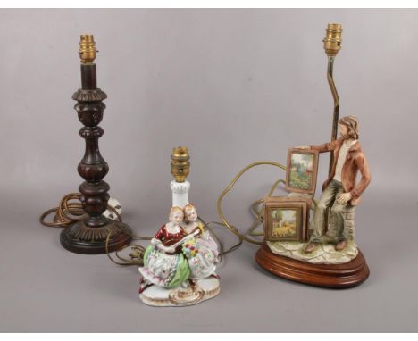 Three Table lamps, two ceramic figurine and wooden example  