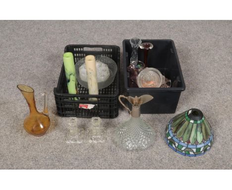 A selection of glassware to include, a Tiffany style lamp shade, a glass decanter with metal pourer and a pair of glass candl