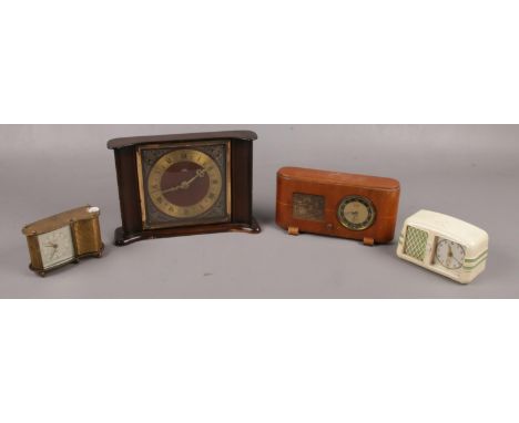 Three small alarm clocks to include Kasier, Peter, etc along with a Smith's mantel clock.  