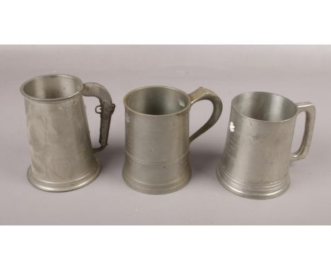 Three English Pewter Tankards to include, an Pewter tankard made in Sheffield with pistol handle, a "James Yates" tankard pre