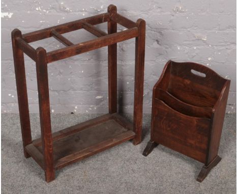 An oak stick stand along with an oak magazine rack.  