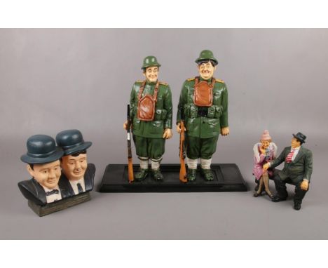 A group of Laurel &amp; Hardy ceramic figures, military uniform, bust of laurel &amp; Hardy example  Military figure &amp; gu