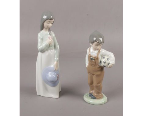 Two NAO by Lladro figures, boy footballer, Lady with hat  