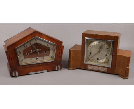 An art deco mahogany presentation mantel clock along with an art deco inlaid mahogany mantel clock.  