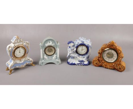 Four ceramic alarm clocks to include, a Landex Royal craft and Coral in china blue and white etc.  