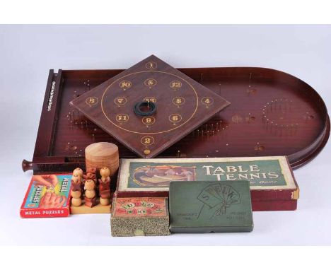 A collection of vintage games including Jaques and son tiddledy winks and spelka, table tennis plus modern quoits and a bagat