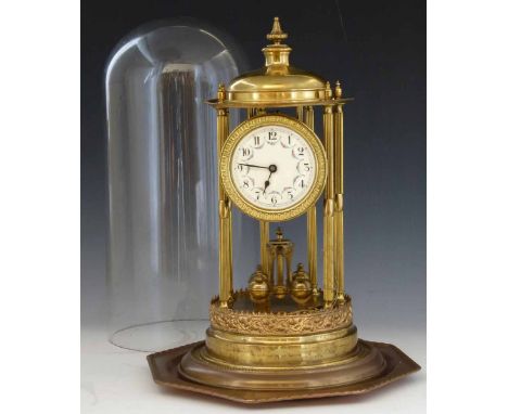 French or German 400-day brass torsion clock, circa 1900, modelled as a classical temple, the porcelain dial on a single barr