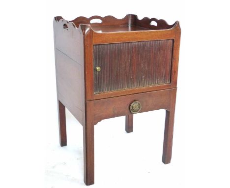 George III mahogany bedside commode, galleried top with lifting handles above tambour cupboard door, base with slide converte