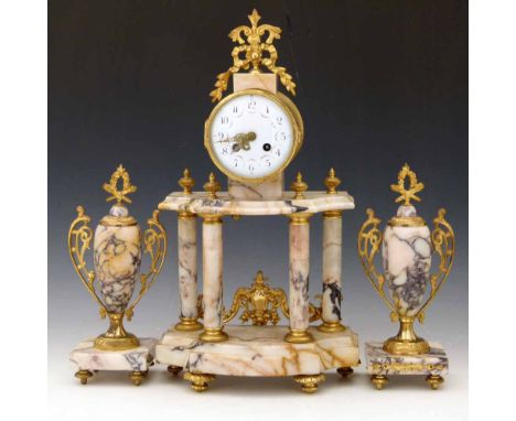 French marble and gilt metal clock set, the drumhead case on four columns with a white enamel dial and eight day movement by 