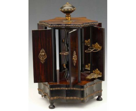 French or Swiss rosewood musical cigar carousel, circa 1900, of hexagonal section, with opening sides revealing gilt metal ci