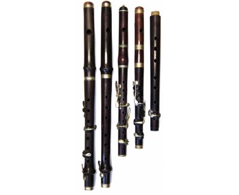 Rosewood Piccolo by Hawkes & Son London, also three small flutes, on by Kay & Co. Worcester,  the other two unmarked, also a 