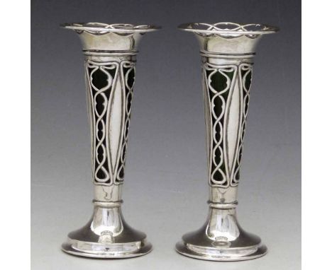 Pair of weighted silver art nouveau trumpet vases with open work sides and green glass liners, WH Haseler, Birmingham 1909, h