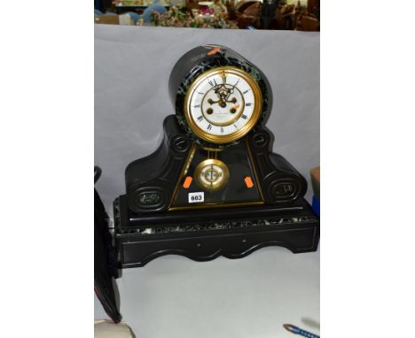 A LATE 19TH CENTURY BLACK SLATE AND MARBLE MANTEL CLOCK, the white enamel dial in a drum shaped case, Roman numerals, brocot 