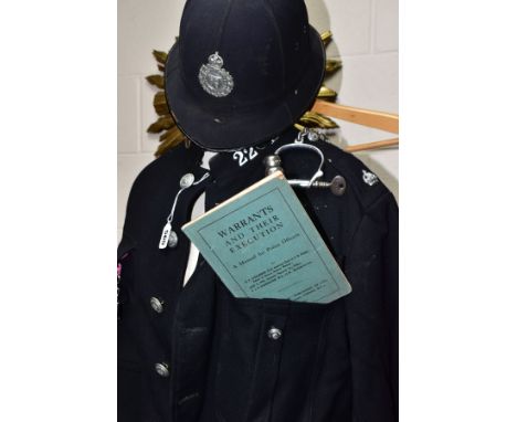 POLICE INTEREST, A POLICE TUNIC, HELMETS, PHOTOGRAPHS, HANDCUFFS ETC, comprising a Warwickshire Constabulary tunic, numbered 