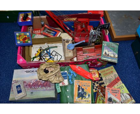 A BOX OF CHILDRENS VINTAGE TOYS AND GAMES, including a Tri-ang red painted metal crane with decals for   Jones KL44 Crane , m