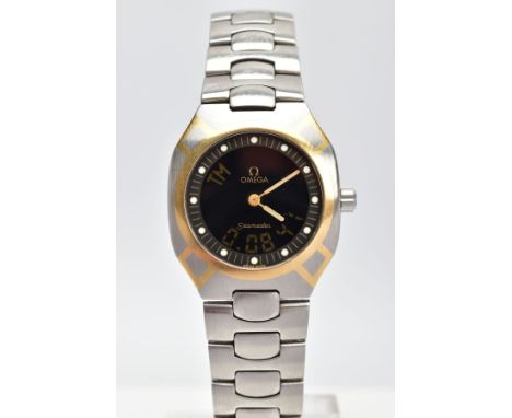 AN OMEGA SEAMASTER WRISTWATCH, two tone watch with a satin finish steel strap and a fold over push button deployment clasp, b