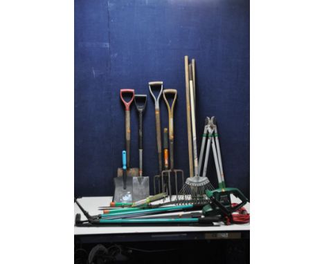 A COLLECTION OF GARDENING TOOLS to include various different spades, forks, loppers and rakes etc along with a Qualcast Hedge