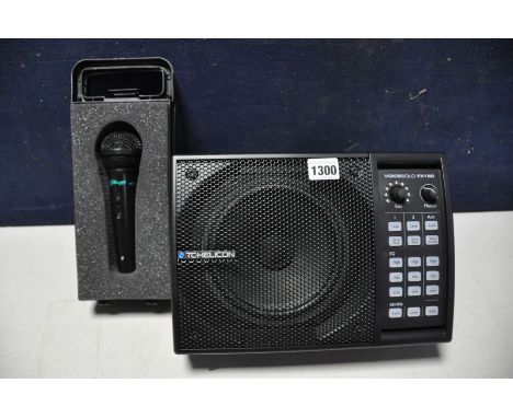 A TC HELICON VOICESOLO FX150 personal wedge monitor with multi effects voice processor along with a Stagg MD-500 dynamic micr