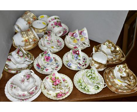 A QUANTITY OF ASSORTED ROYAL ALBERT BONE CHINA CUPS, SAUCERS AND TEA PLATES, ETC, IN A VARIETY OF PATTERNS, including nine 'F