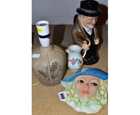 FOUR CERAMIC ITEMS, comprising a Shorter &amp; Son Deco style face mask, height 17cm, a late 18th Century sparrow beak jug, h