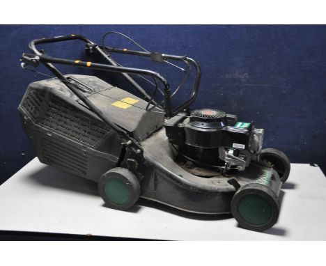 A QUALCAST TROJAN 16 petrol lawn mower, with grass box (engine pulls freely but hasn't been started)