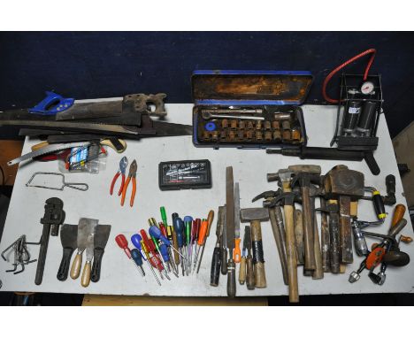 A COLLECTION OF VARIOUS TOOLS to include a selection of hand saws, screwdrivers and hammers etc all in a wooden chest, A Bosc