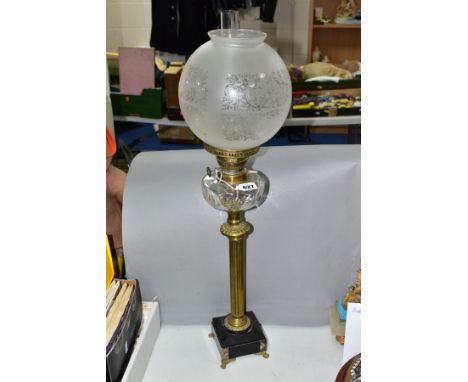 A LATE 19TH CENTURY KOSMOS BRENNER BRASS COLUMN OIL LAMP, acid etched clear and opaque spherical glass shade with loose brass