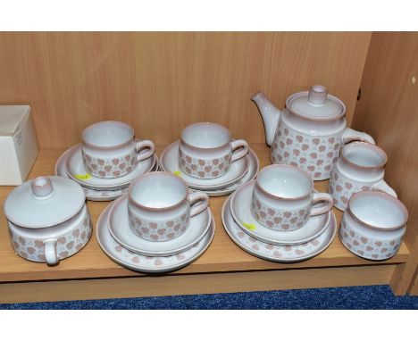 A DENBY FALLING LEAVES PART TEA SET, comprising teapot, milk jug, sugar bowl, four teacups (one chipped), four saucers, four 