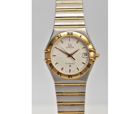 AN OMEGA CONSTELLATION WRISTWATCH, a round case measuring approximately 34mm in diameter, cream textured dial signed Omega Co