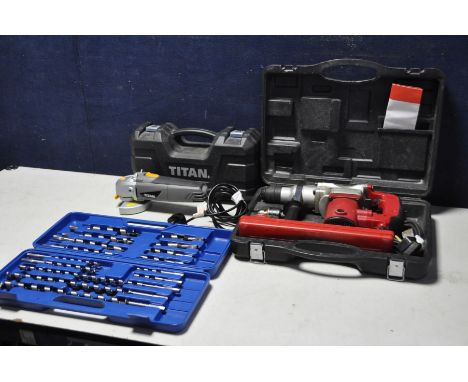 A CHAMPION CRHD850 850w rotary hammer drill in case with drill bits, a Titan TTB281GRD angle grinder with case (both PAT pass