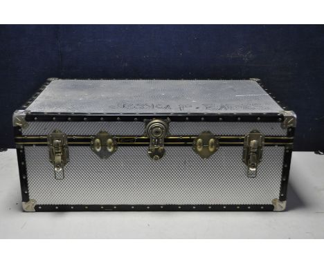 A ALUMINIUM MOSSMAN TRAVELING TRUNK measuring 90cm width 51cm depth locked with no key some writing to aluminium top