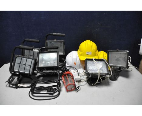 A COLLECTION OF OUTDOOR AND FLOOD LIGHTING to include four floor standing, two security lights with wall mounts one with moti