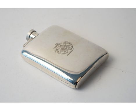 A silver spirit flask of curved rectangular form, monogram engraved, Birmingham 1916, weight 171 gms. Condition Report Overal