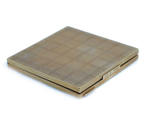 A lady's 9ct gold square powder compact, the exterior engine turned, the thumb-piece detailed 25.2.1947, fitted with a mirror