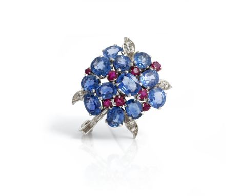 A sapphire, ruby and diamond brooch, in a floral design, mounted with oval cut sapphires, smaller circular cut rubies, baguet