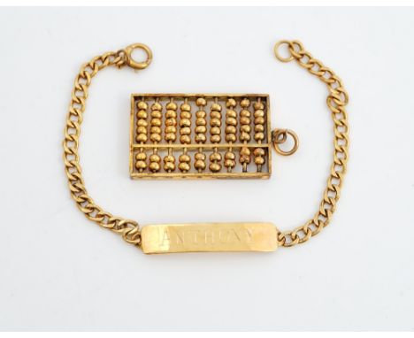 A gold pendant, designed as an abacus, detailed 14 K and a gold faceted curb link identity bracelet, detailed Anthony, combin