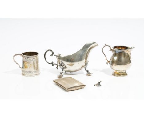 Silver, comprising; a sauceboat, with a scrolled handle (one of the three feet detached, but present), London 1924, a rectang