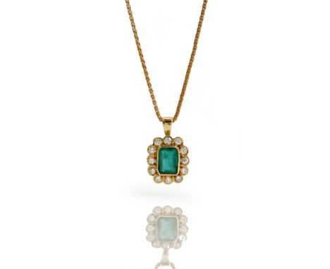 An 18ct gold, emerald and diamond cluster pendant, mounted with the rectangular step cut emerald in a surround of circular cu