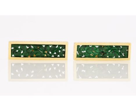 A pair of Grima 18ct gold and jade cufflinks, the rectangular fronts carved and pierced with foliate decoration, detailed 0,7